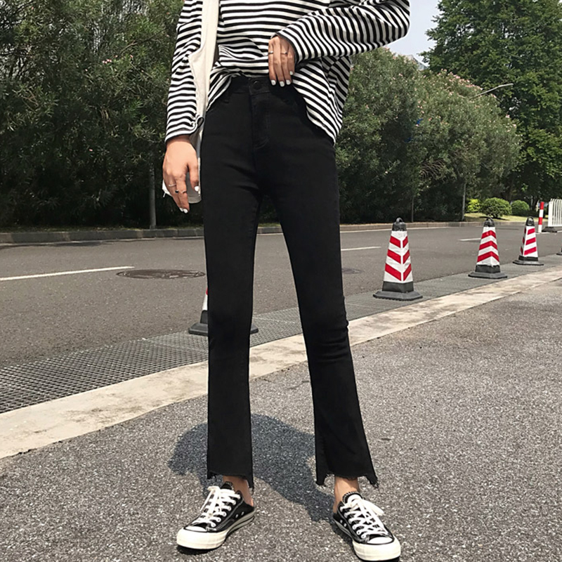 不規則褲腳牛仔褲女2018秋裝新款高腰微喇褲子學生顯瘦黑色九分褲